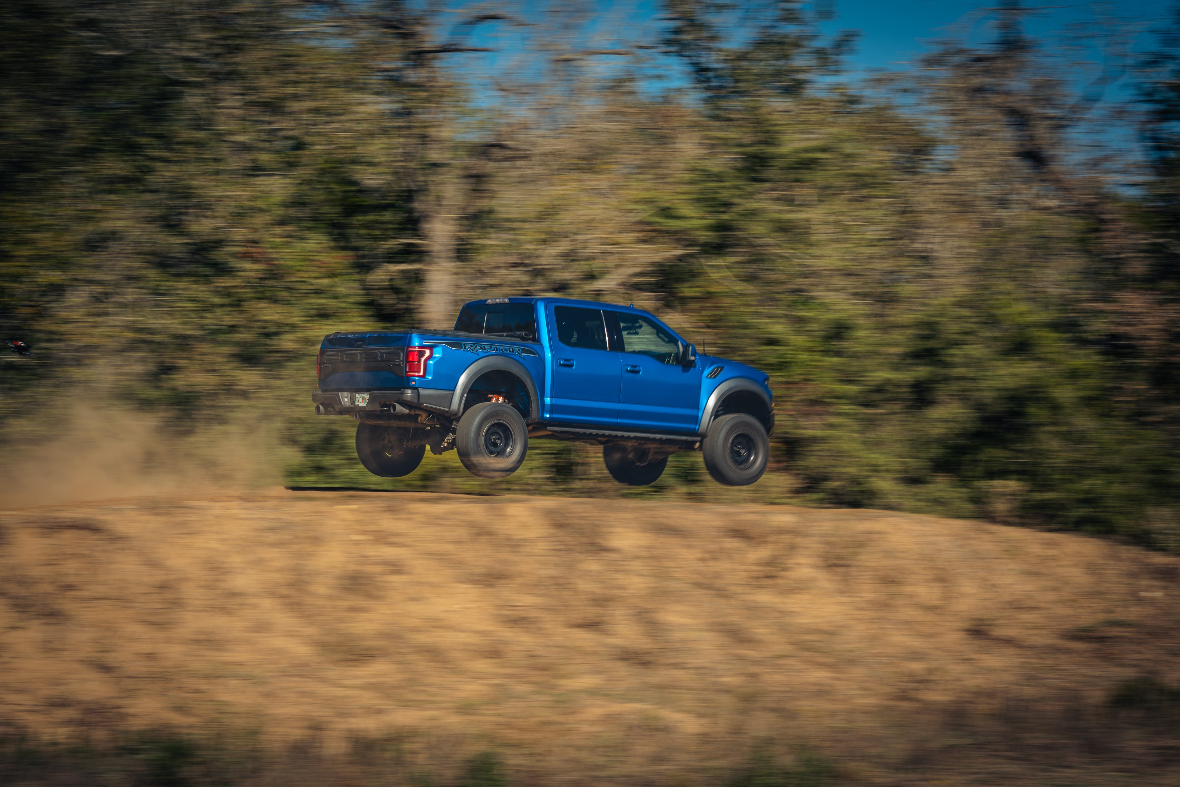 Ford Raptor airborne — rear motion blur side